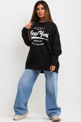 black oversized sweatshirt with new york slogan