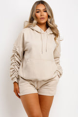 short tracksuit hoodie and shorts lounge set airport outfit