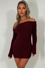 knitted jumper dress with long sleeves and off shoulder neckline styledup christmas party outfit 
