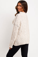 womens cable knit jumper with contrast stitches styled up 