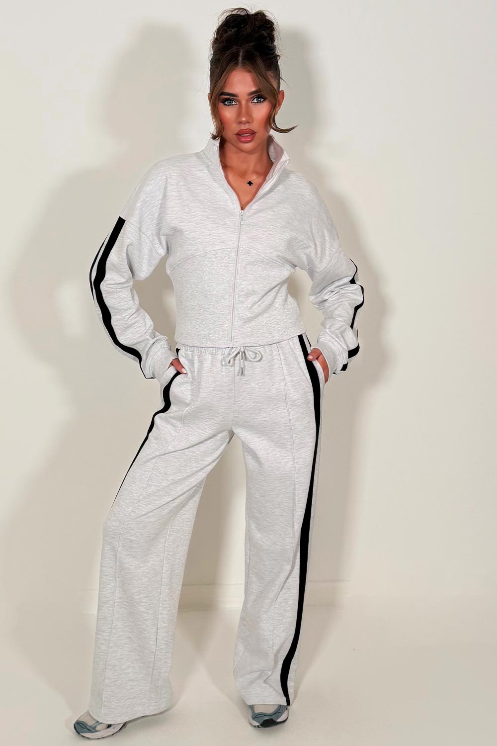 zip up sweatshirt and wide leg joggers womens tracksuit with side stripe perfect comfy cosy airport outfit for womens 