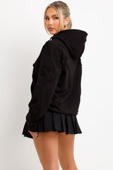 womens oversized hooded sweatshirt with cross applique 