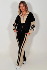 womens black tracksuit zip up sweatshirt top & wide leg jogger airport outfit with stripe detail