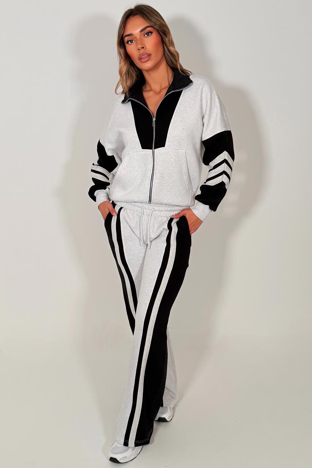 zip up sweatshirt top and wide leg joggers tracksuit for womens styledup airport outfit 