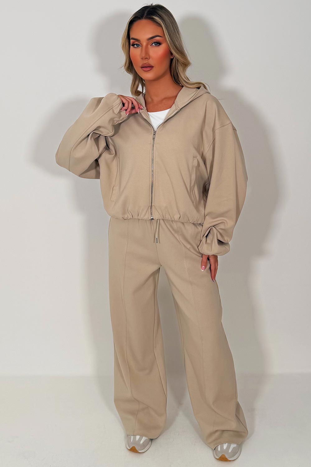 womens seam detail joggers and soft bomber jacket with elastic hem styled up fashion