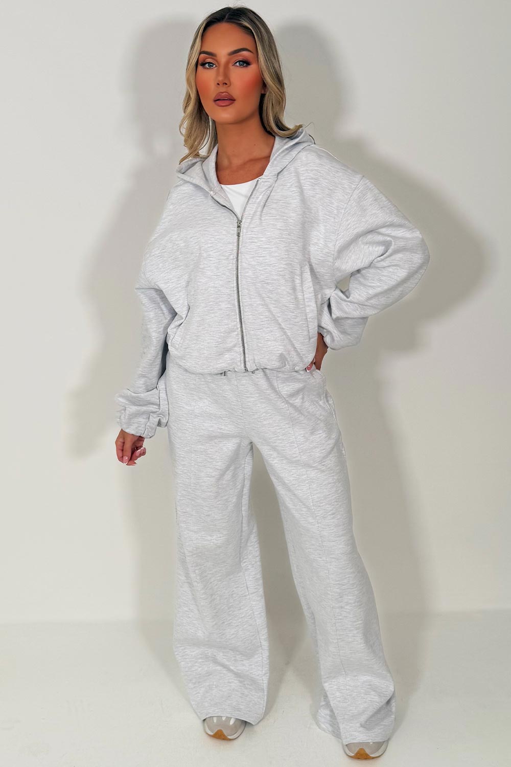 womens seam detail joggers and soft bomber jacket with elastic hem styled up fashion