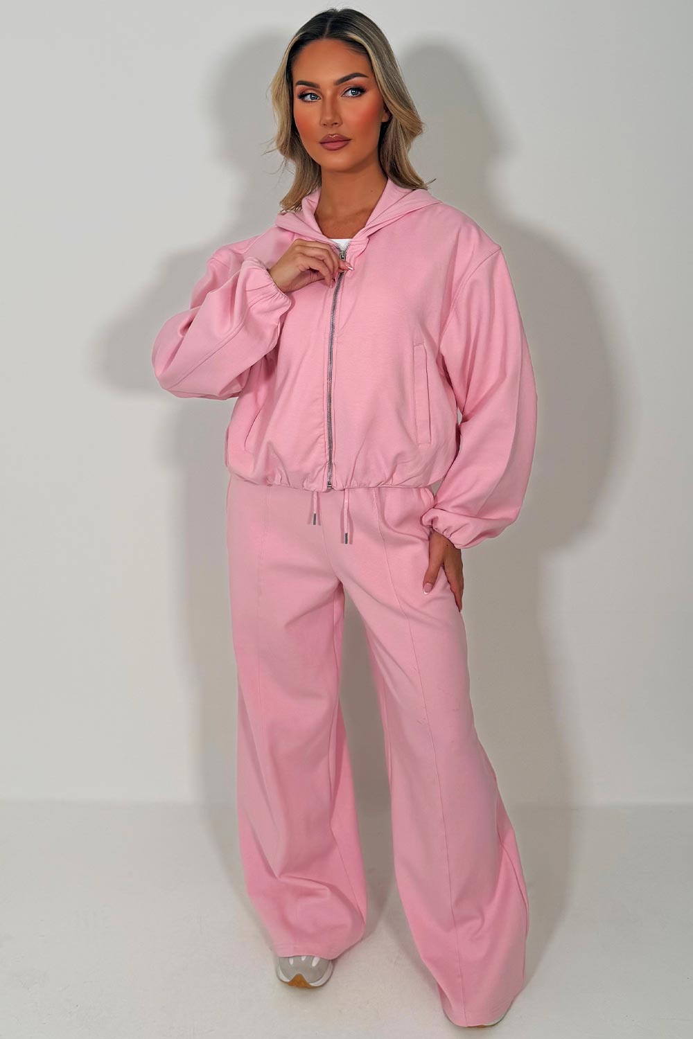 womens seam detail joggers and soft bomber jacket with elastic hem styled up fashion