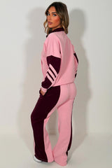 womens pink tracksuit zip up sweatshirt top & wide leg jogger airport outfit with stripe detail