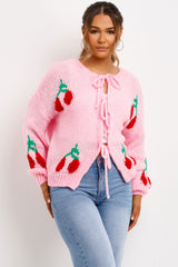 pink knitted tie front cardigan with cherries