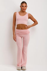 pink ruched sleeve cardigan crop top and fold detail flared trousers three piece matching lounge set