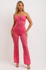 lace jumpsuit with skinny flared legs and corset detail