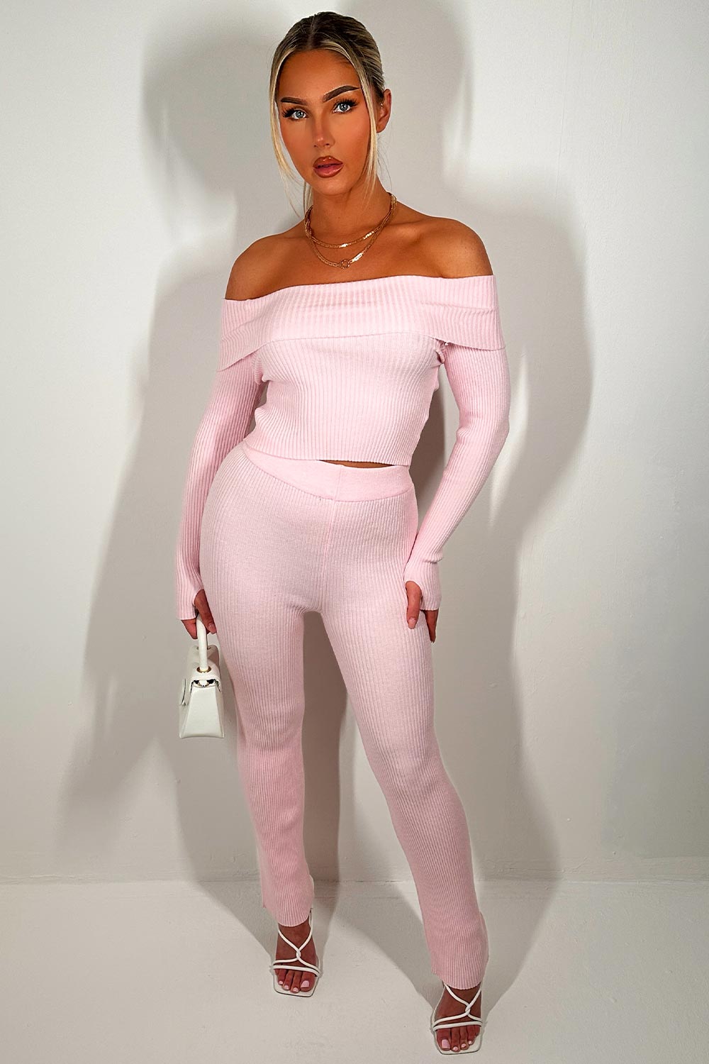 pink ribbed off shoulder top and trousers co ord set going out outfit