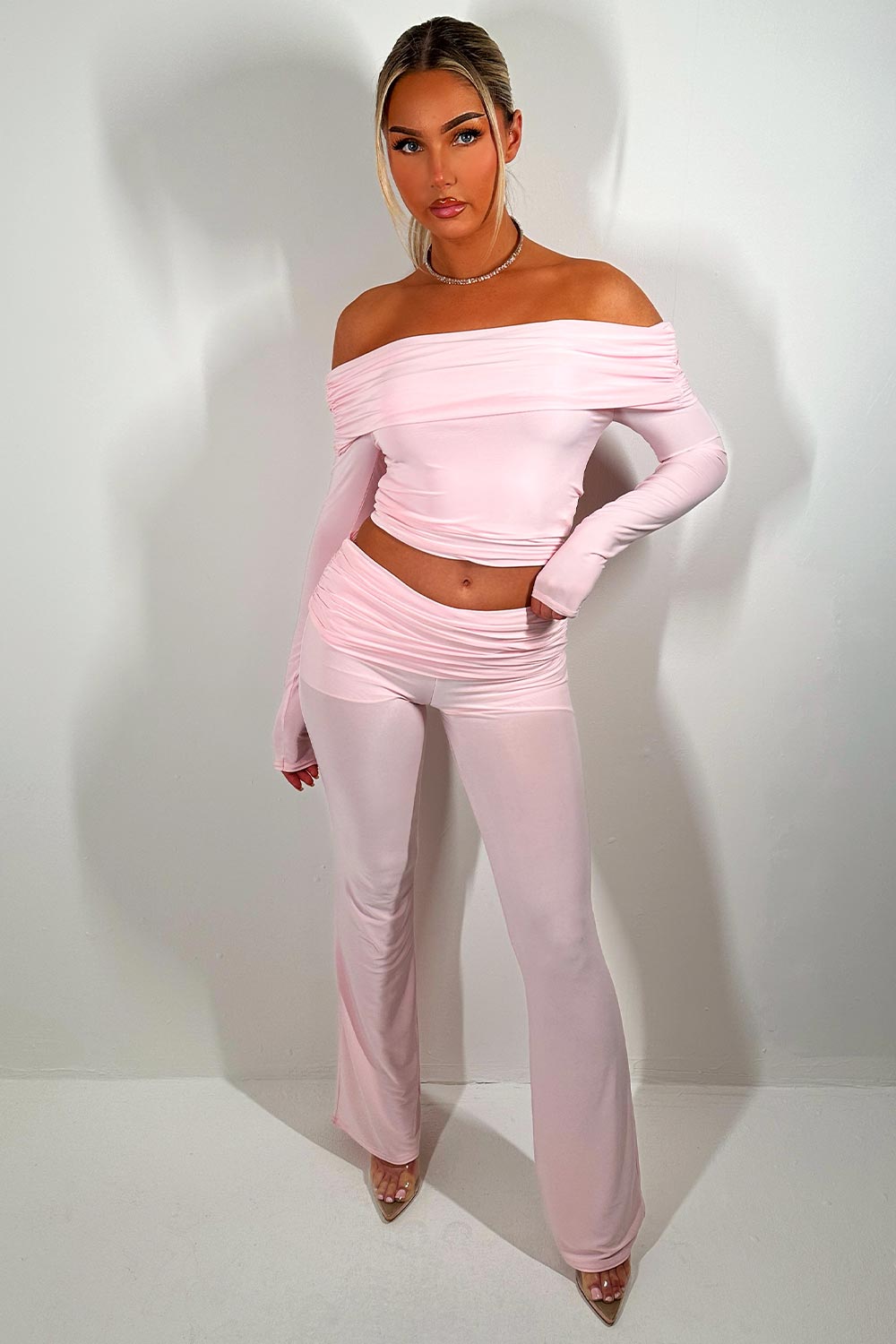 fold detail flare trousers and off shoulder long sleeve crop top two piece set going out occasion date night brunch outfit