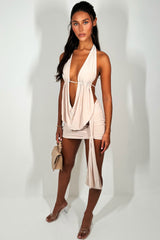 beige backless cowl halter neck top and drape mini skirt co ord set going out outfit