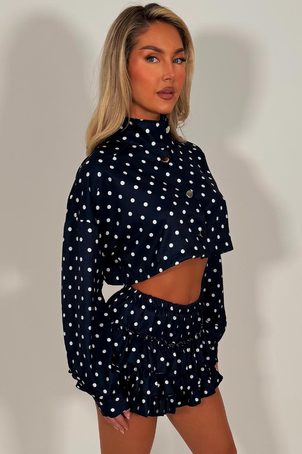 polka dot long sleeve crop jacket and ruffle frilly skort two piece set styledup going out outfits