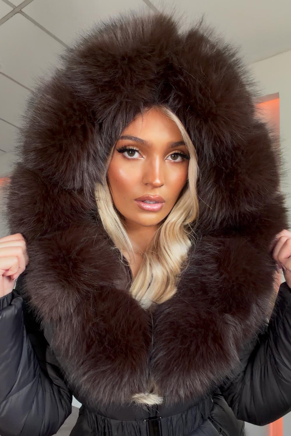 black puffer coat with big fur hood styledup uk