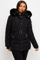 black puffer coat with fur hood and belt styledup
