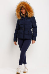 puffer coat with fur hood styled up