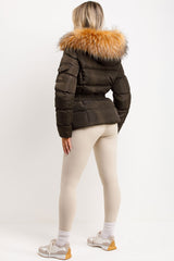 womens winter coat with faux fur hood and belt styled up 