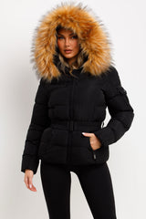 puffer jacket with fluffy fur hood styled up