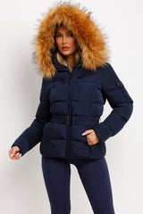 puffer jacket with fluffy fur hood styled up