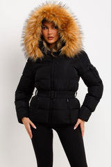 womens winter coat with faux fur hood and belt styled up 