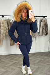 women’s belted puffer jacket fur hood navy styled up