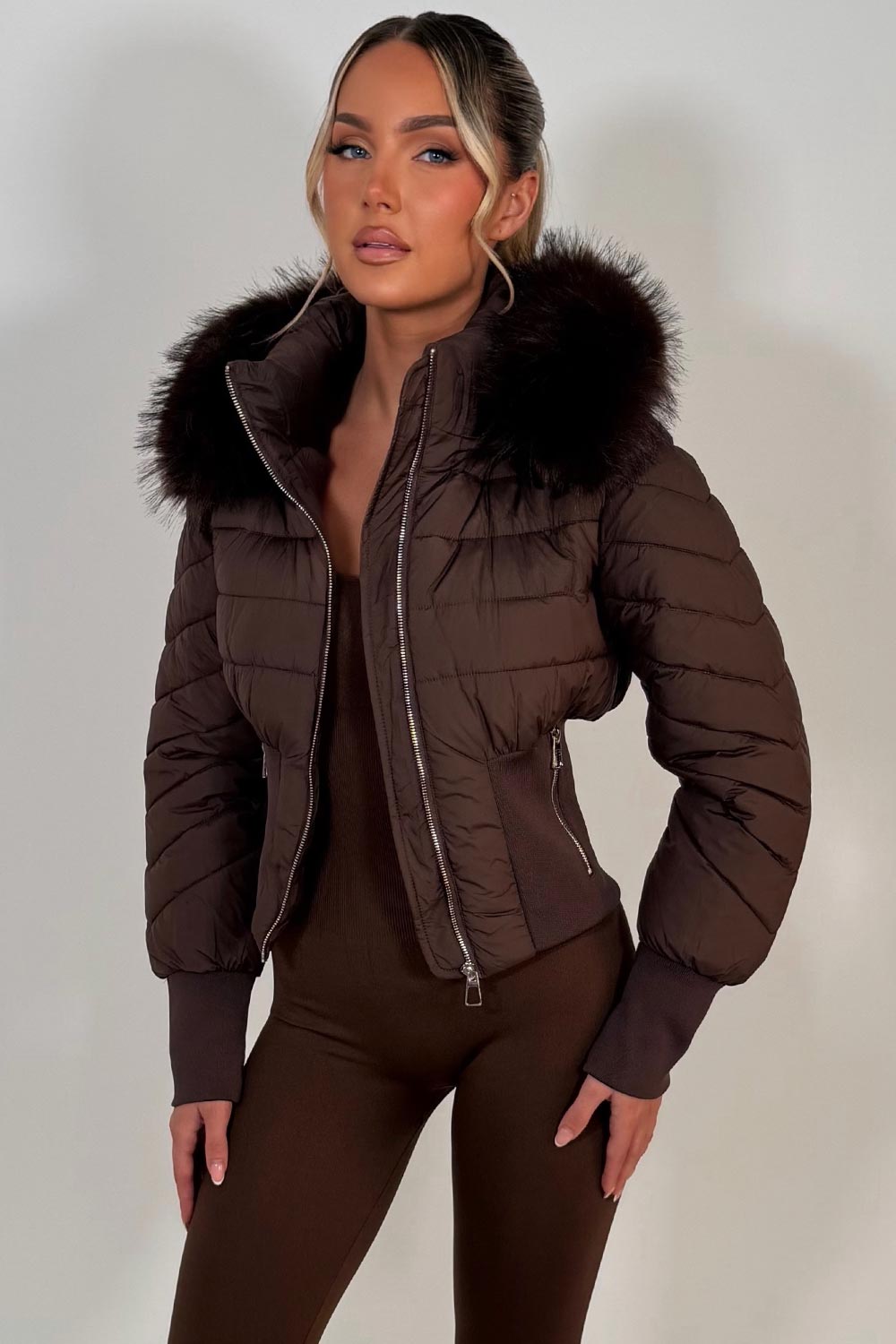 faux fur hood padded puffer jacket with cinched waist womens winter ski outerwear styledup uk