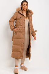 long puffer coat with fur hood and belt womens outerwear