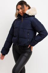 womens navy puffer jacket styled up