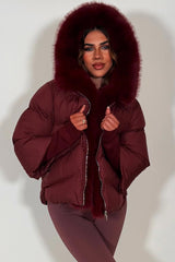 womens burgundy fur hood puffer jacket with fur trim on the front styledup