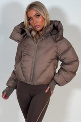 winter puffer jacket with hood for womens in taupe colour 