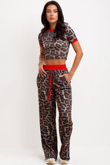 leopard print ribbed wide leg trousers and crop top co ord lounge set airport outfit