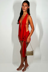 red drape mini skirt and cowl halter neck backless top co ord set going out festival rave outfit