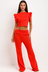 ruffle frill sleeve top and skinny flare trouaers with fold detail two piece set red