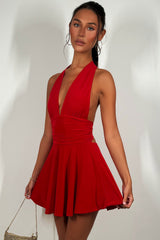 halter neck mini dress with open back red