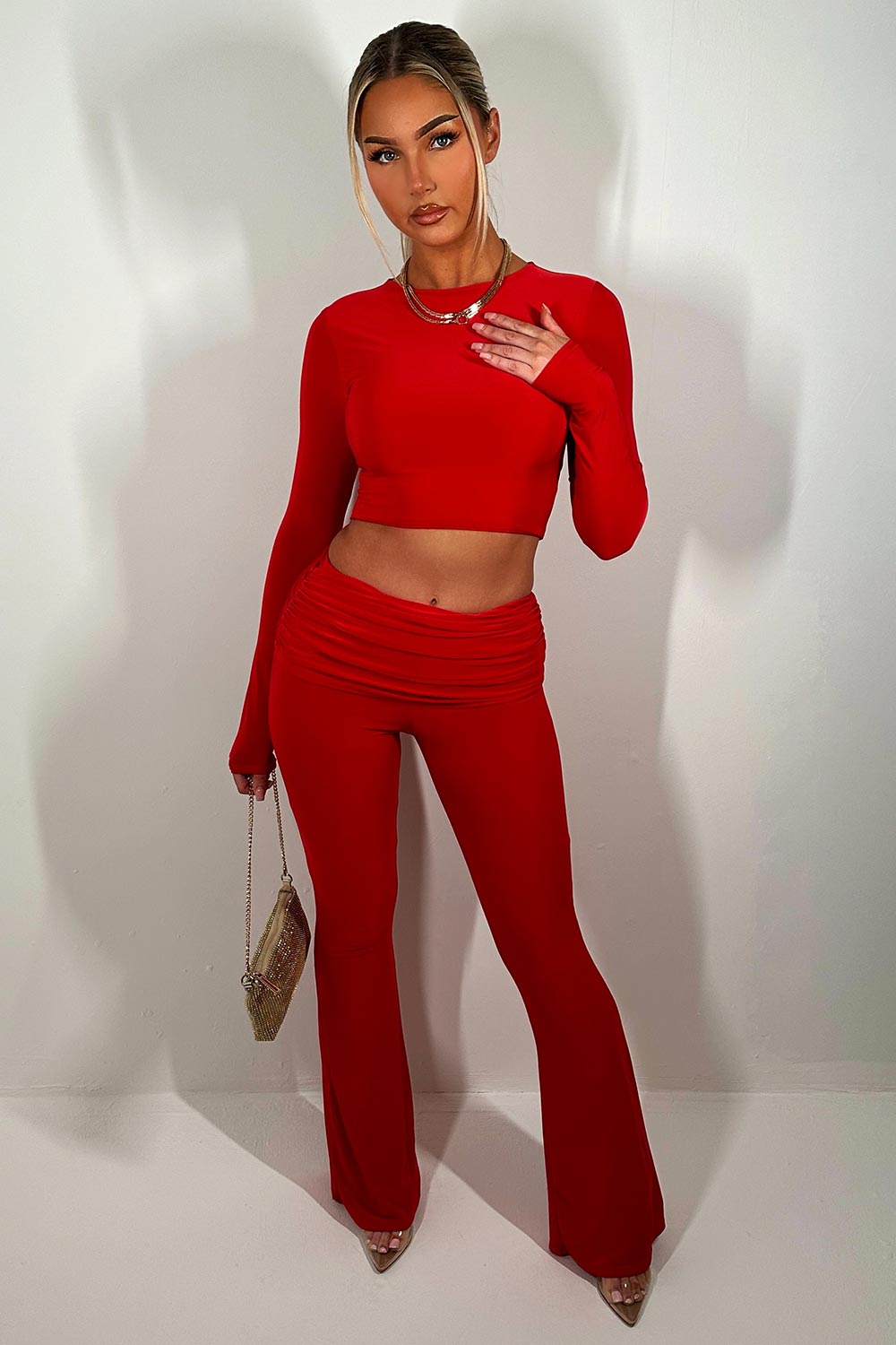 womens flared trousers with fold over detail crop top with long sleeves two piece set going out outfit red