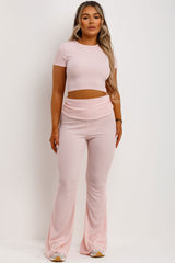 ribbed crop top and skinny flare trousers with fold detail