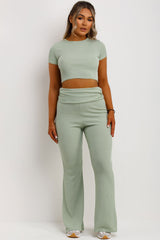 ribbed crop top and skinny flare trousers with fold detail
