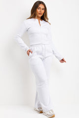 zip up crop sweatshirt corset detail and joggers tracksuit co ord set styledup airport travelling outfit 