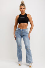 flared jeans with ripped knee womens