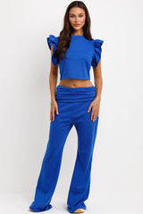 low rise flare trousers and frill ruffle top two piece set