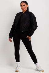 bomber jacket with ruched sleeves
