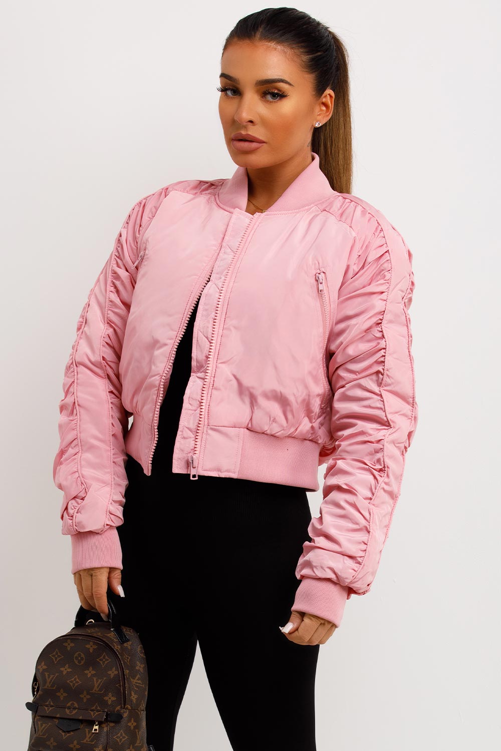 pink bomber jacket with ruched sleeves