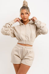 womens runner shorts and crop zip hoodie with ruched sleeves tracksuit set