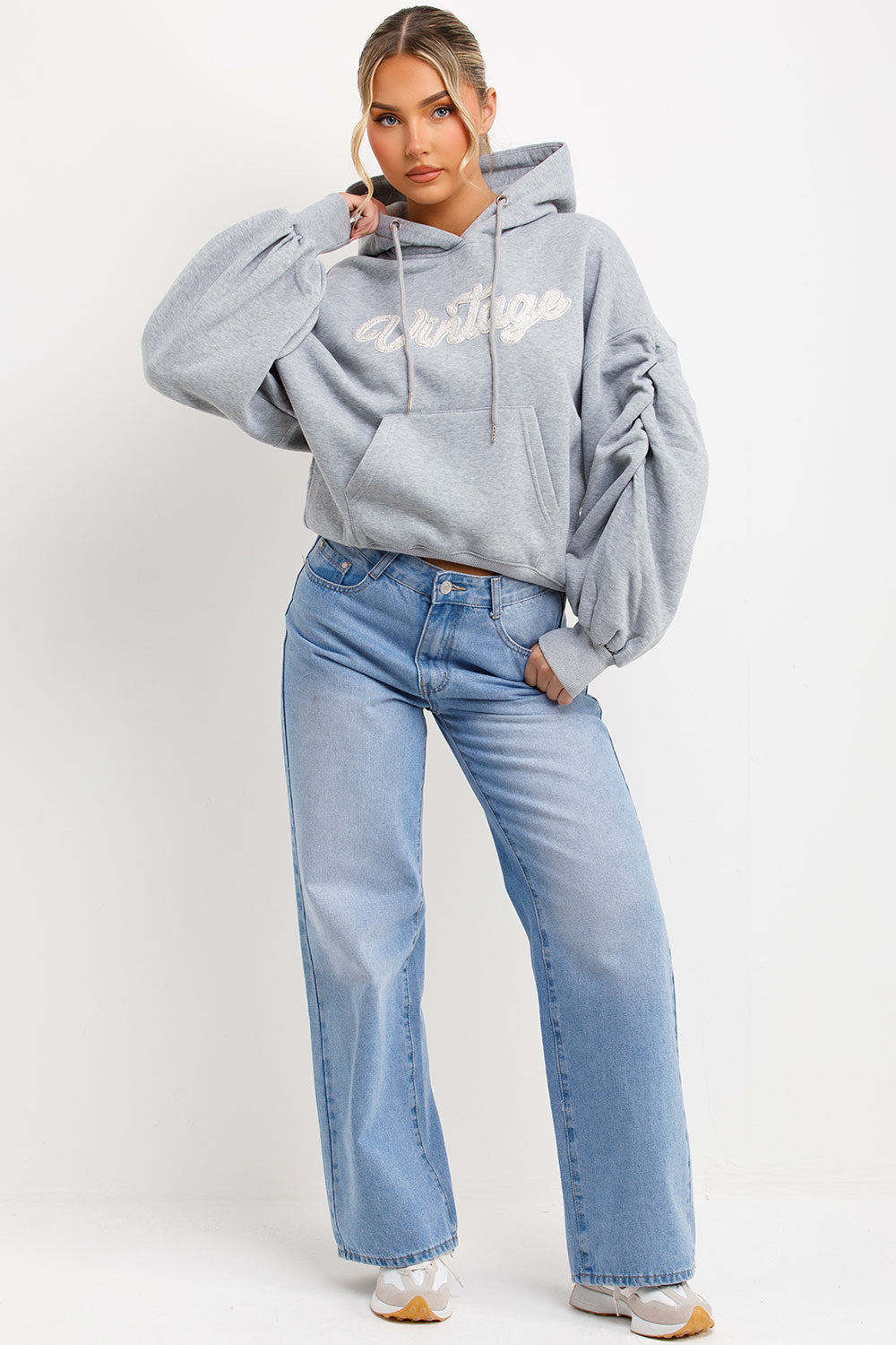 womens ruched sleeve hoodie with vintage slogan