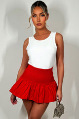 red puff ball skirt with high waist