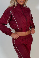 burgundy crop funnel neck jacket and wide leg trousers tracksuit holiday festival rave outfit styledup uk