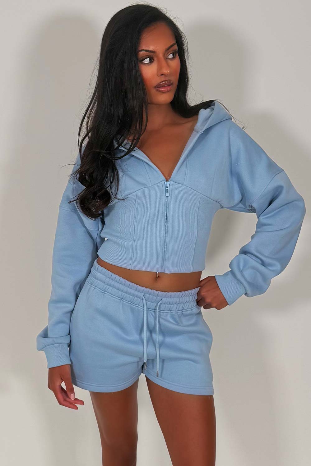 cinched waist crop corset hoodie and shorts tracksuit airport outfit co ord 