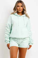 womens runner shorts and hoodie tracksuit set airport outfit